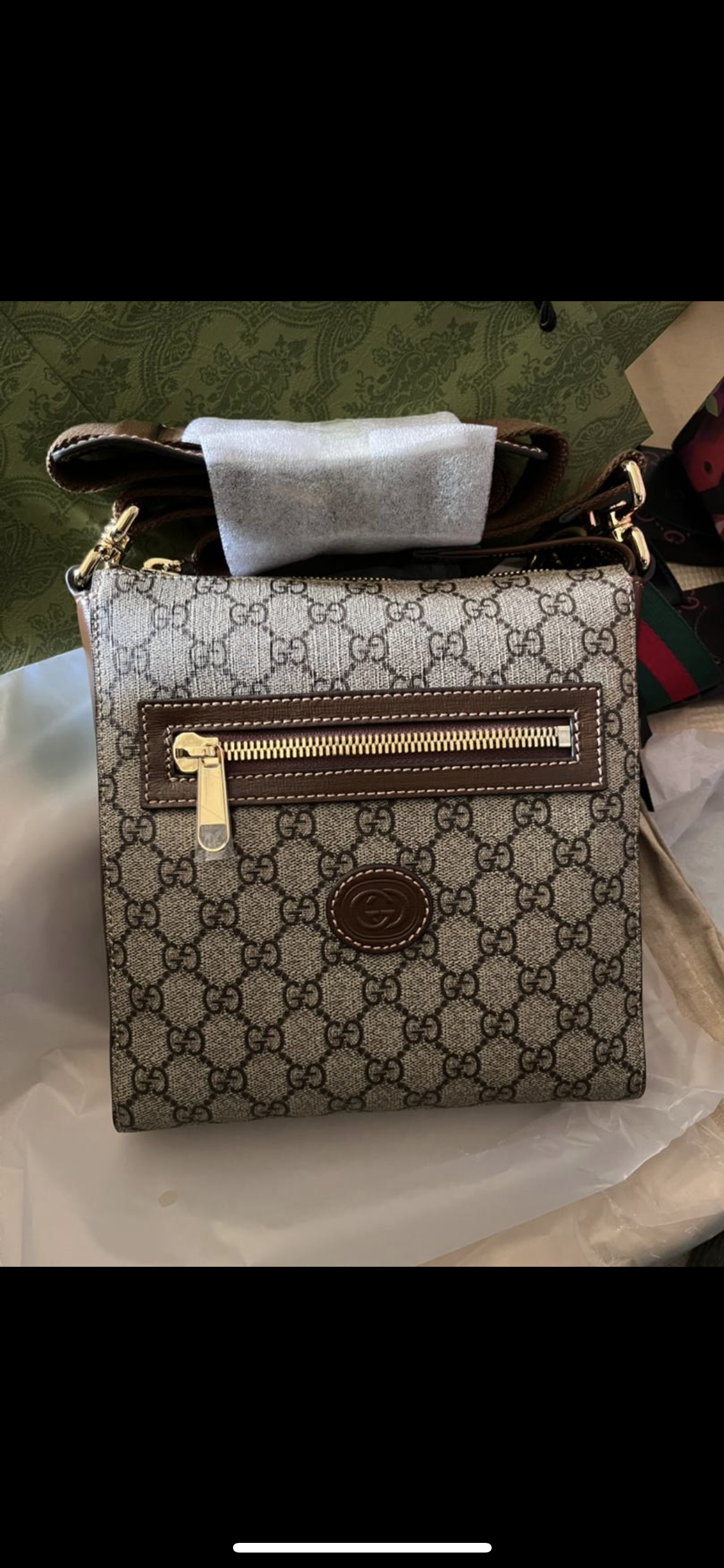 Sacoche Gg detail en cuir marron  facture